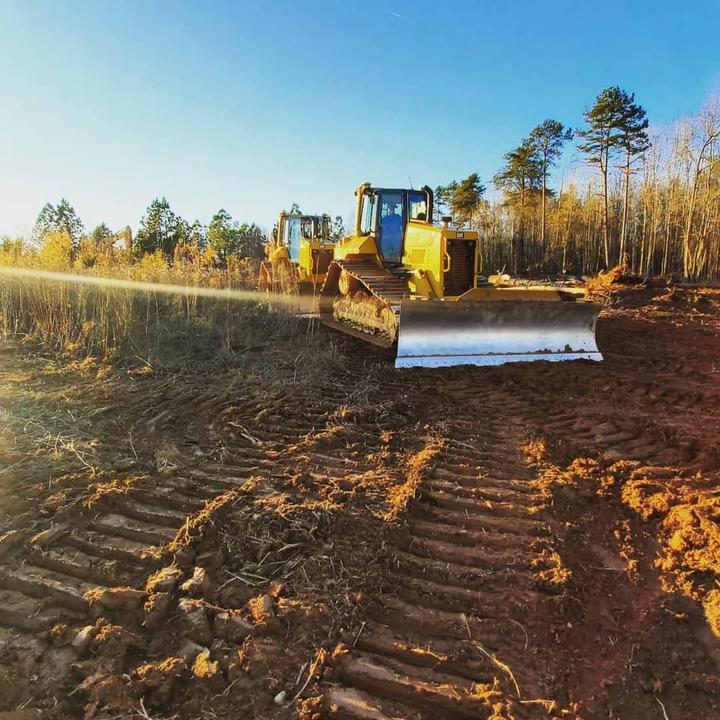 fall line construction jobsite with heavy equipment doing sitework